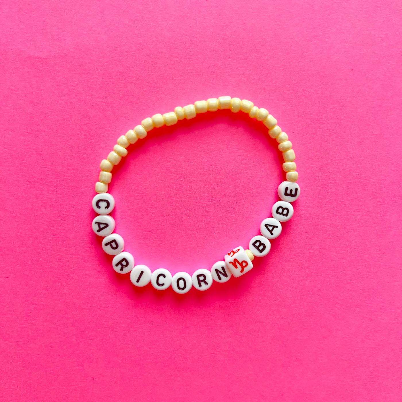 Capricorn Zodiac Bracelet: Rose Gold Letter beads with yellow jade and  tigers eye beads