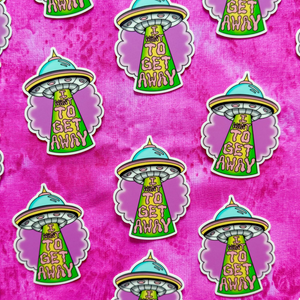 Pattern of green UFO stickers with text on a pink background