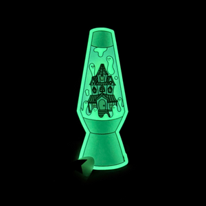 Glowing lava lamp with a haunted house design on a black background