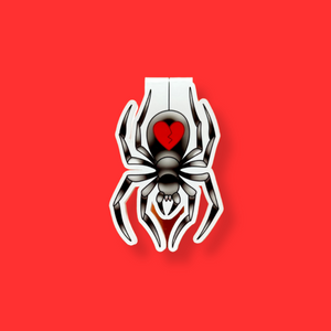 Spider design with a red heart magnetic bookmark on a red background